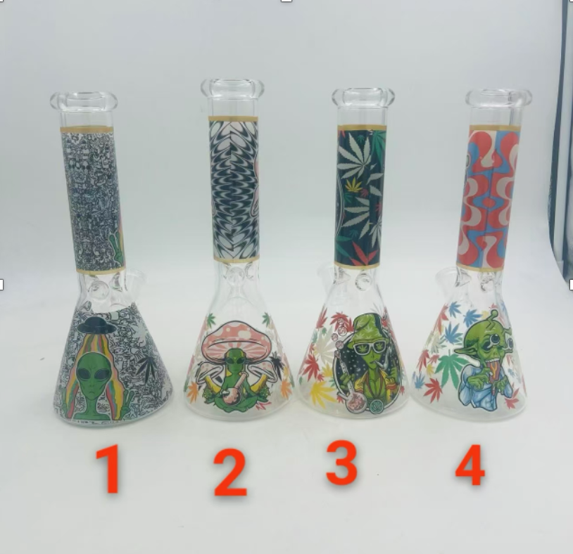 Aliens And Hemp Leaves Glow Glass Beaker Water Pipe-10" / 14mm F / Designs Vary