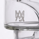 Close-up of MJ Arsenal logo on Apex Mini Rig, showcasing high-quality borosilicate glass