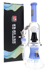 6B Glass 11.5 inch skull showerhead perc bong with a periwinkle neck and base, shown next to its retail box