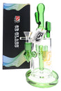 6B Glass Cactus Scorpion Perc 9.5 inch bong in green glass shown beside its black 6B Glass retail box