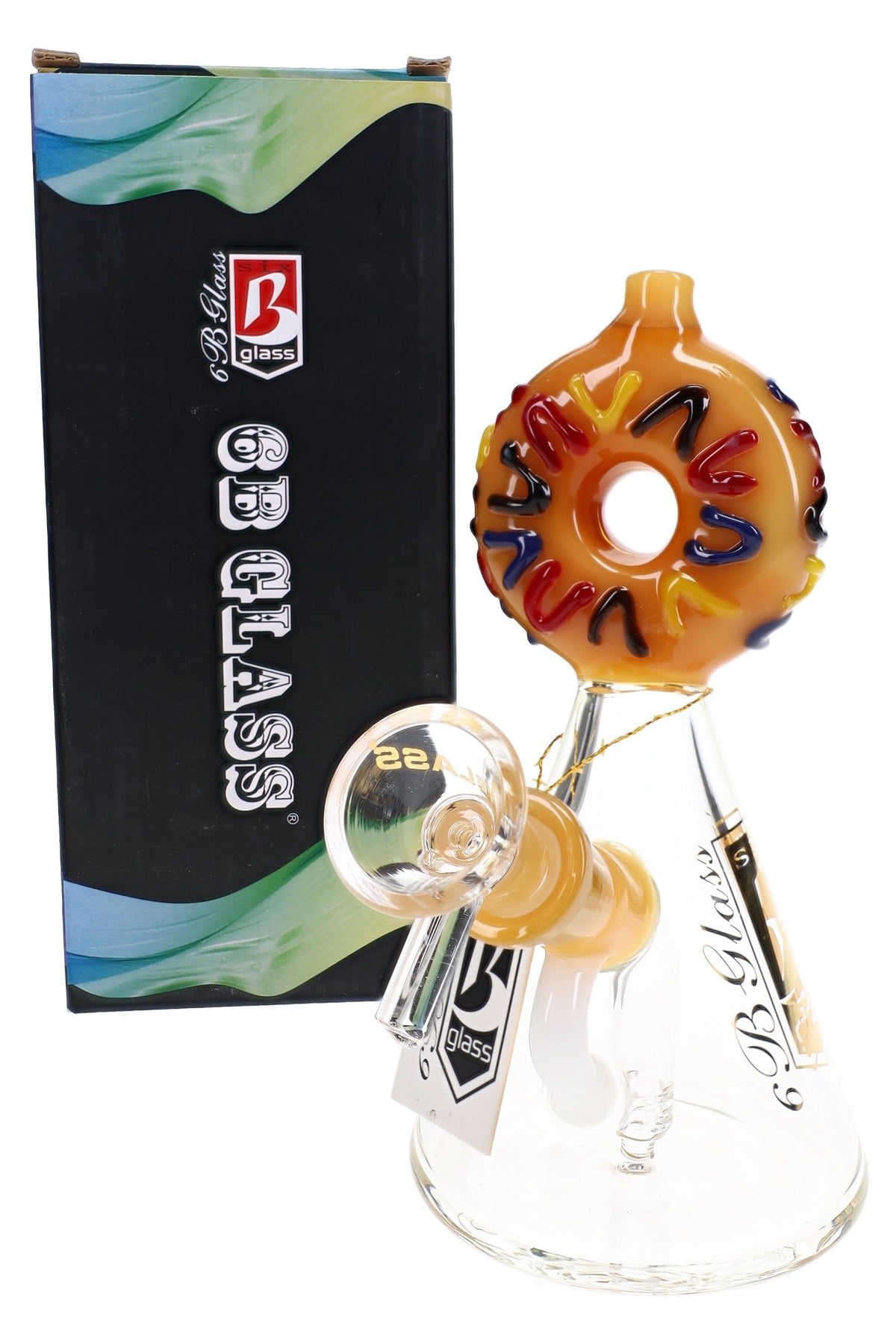 6B Glass donut beaker bong with an amber frosted donut mouthpiece and blue and red sprinkles beside its box