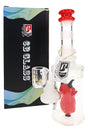 6B Glass frosted demon perc dab rig with a red mouthpiece and a horned demon percolator beside its box