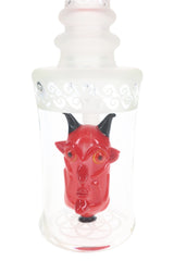 Close view of the red horned demon head percolator inside the clear chamber of the 6B Glass dab rig