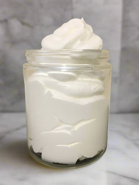 Elite Creed Natural Pineapple Sage CBD Body Butter in glass jar, front view on marble background