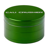 Cali Crusher O.G. 2.5" Aluminum 4 Piece Grinder in Green, Front View with Logo