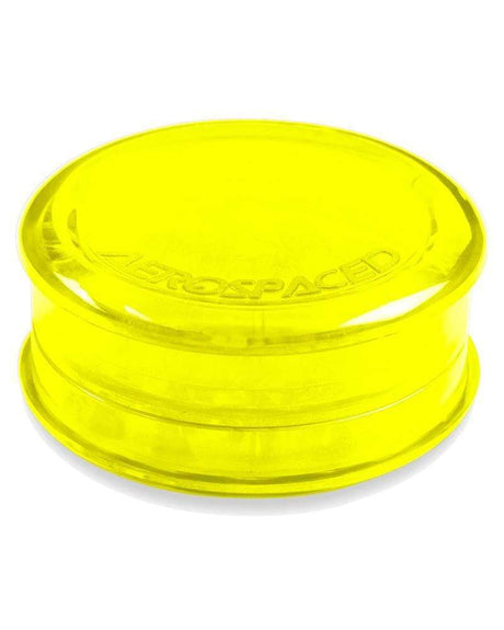 Aerospaced Acrylic 3-Piece Grinder in vibrant yellow, compact and portable design, top view