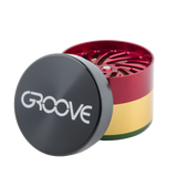 Aerospaced Groove 4-Piece Grinder in Rasta colors, compact and portable design, side view