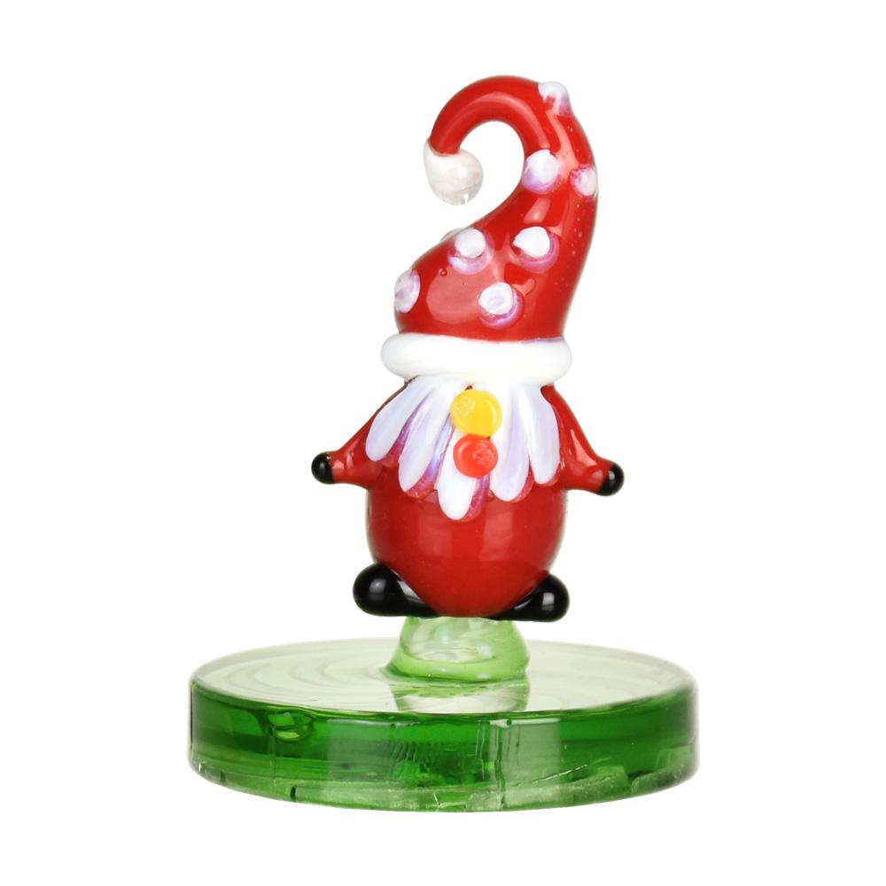 Borosilicate glass carb cap with whimsical mushroom design on a green base, front view, for dab rigs
