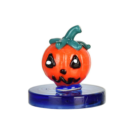 Colorful mushroom-shaped glass carb cap with blue base for dab rigs, front view on white background