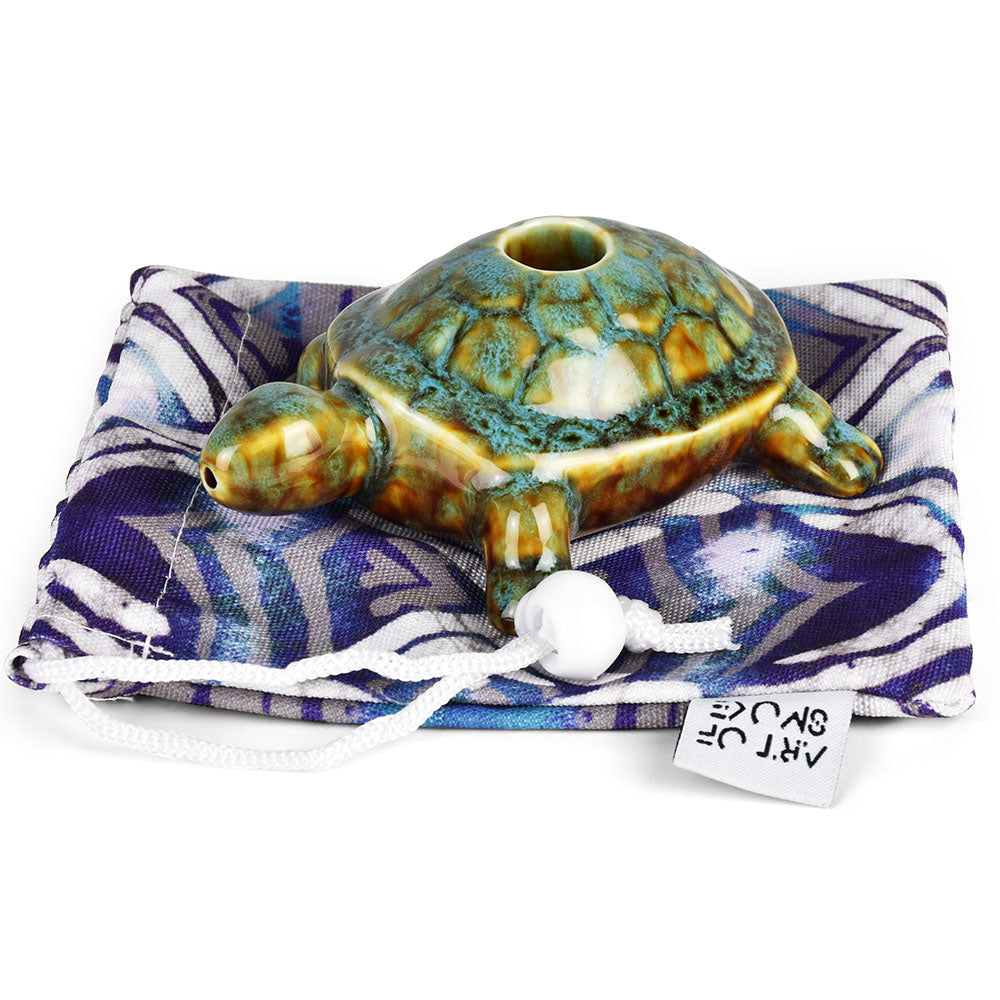 Art of Smoke gold and green turtle-shaped ceramic pipe with carry bag, ideal for dry herbs