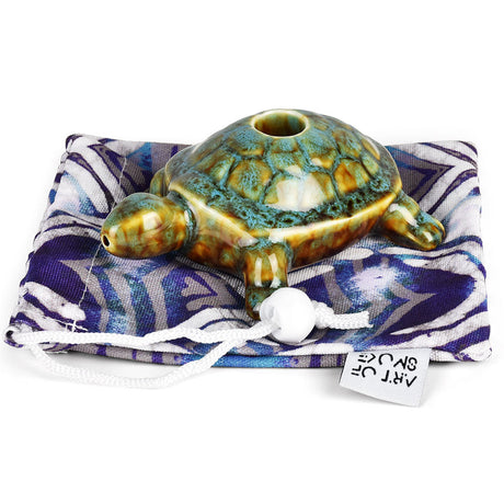 Art of Smoke gold and green turtle-shaped ceramic pipe with carry bag, ideal for dry herbs