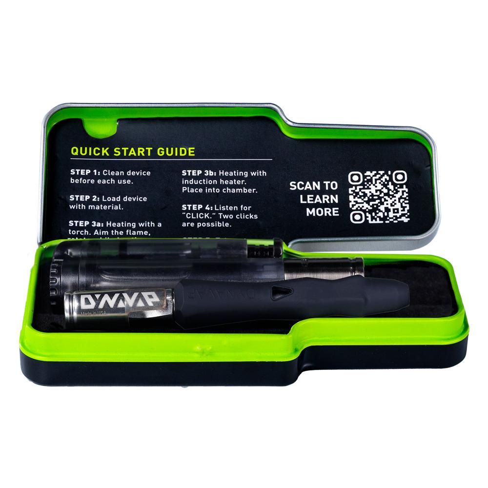 DynaVap The B vaporizer nested inside its included metal tin case, showing the compact travel kit packaging.