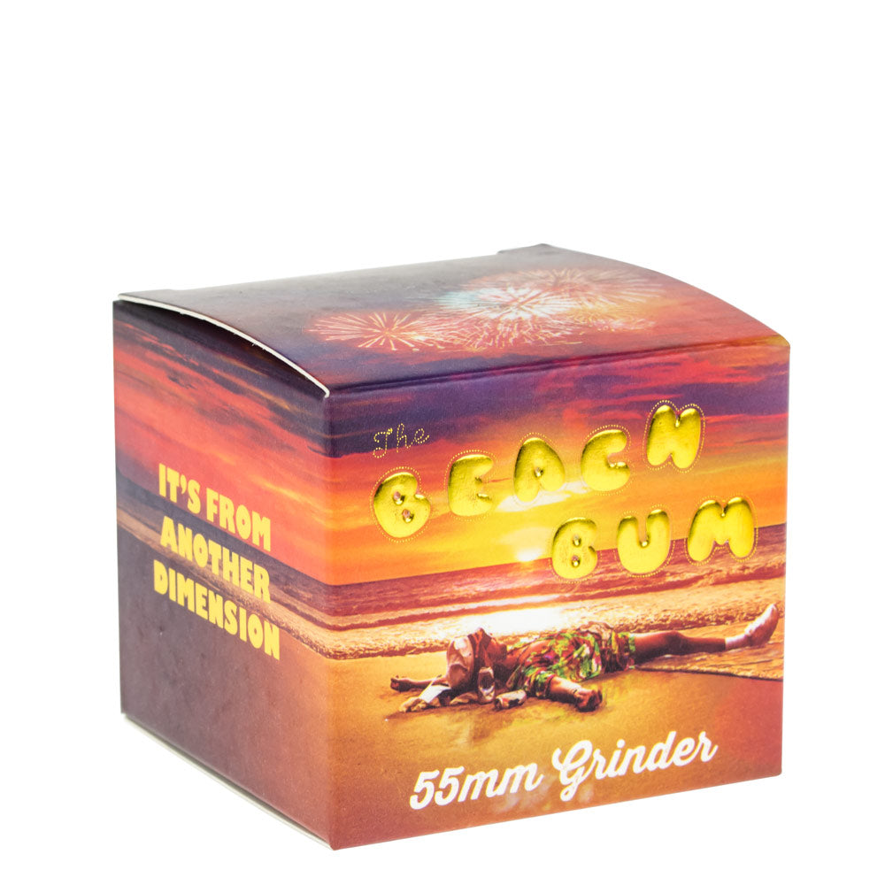 Beach Bum 4-Piece Aluminum Grinder packaging with vibrant sunset beach graphics, front view