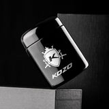 Kozo black UV glass storage jar with the lid lifted off and a humidity packet shown in the hand