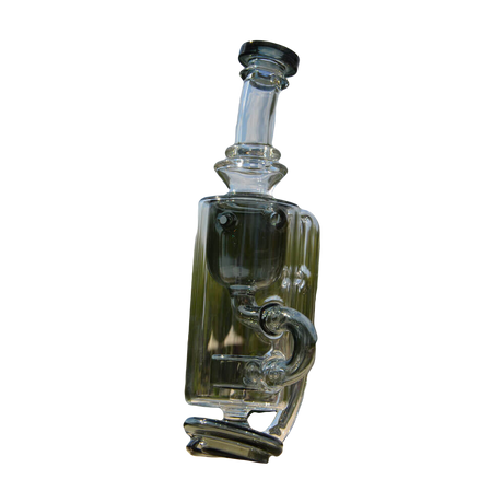 Calibear Puffco Attachment Klein in clear glass with green accents, outdoor side view