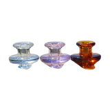 Calibear Puffco Peak Carb Cap set in various colors displayed side by side for dab rigs