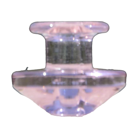 Calibear Puffco Peak Carb Cap in transparent pink, compact design, front view on natural backdrop
