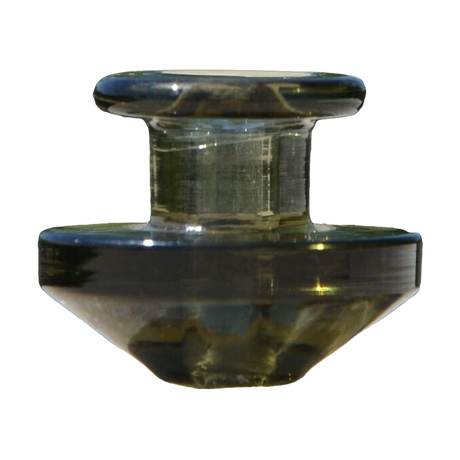 Calibear Puffco Peak Carb Cap in glass, compact design, side view on natural backdrop
