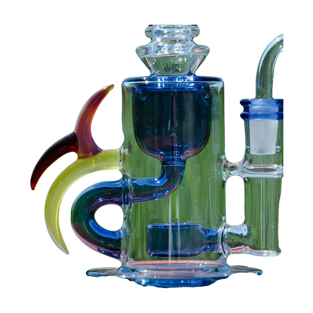 Calibear Ribbing Horn Klein Bong with colorful accents and 90-degree joint, side view on natural backdrop