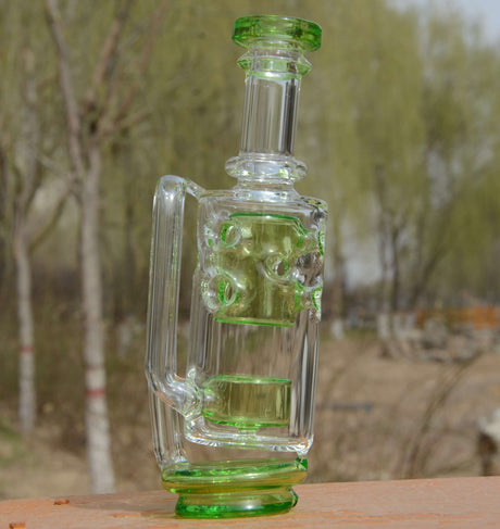Calibear Straight Fab Puffco Attachment in Lime Green, side view, displayed outdoors