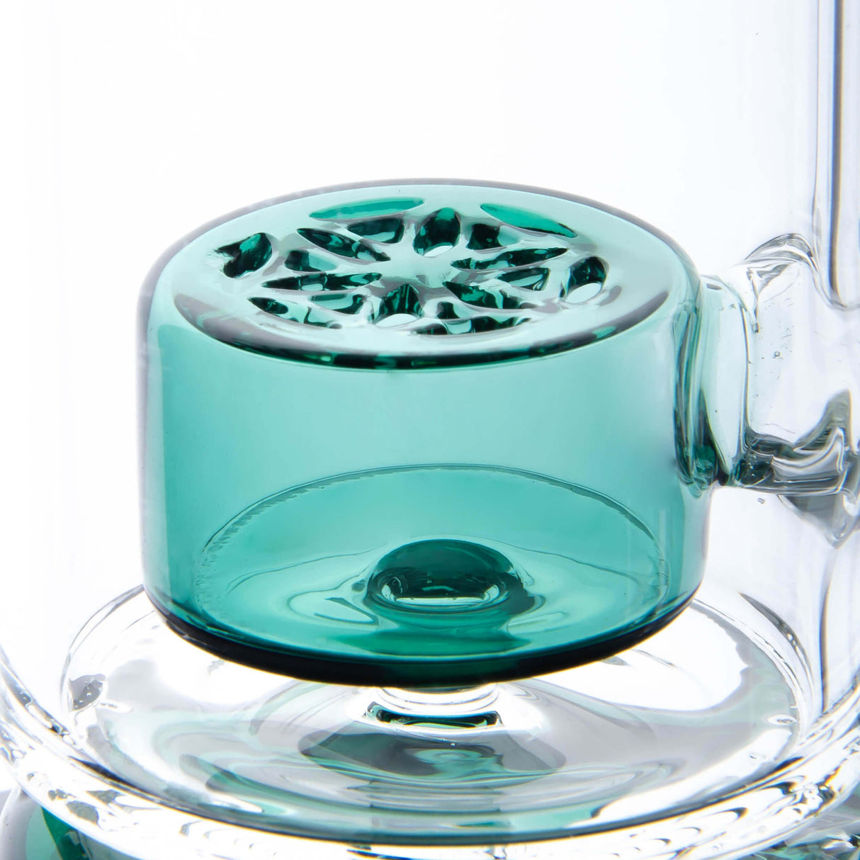 Calibear Straight Fab Puffco Attachment in teal, close-up side view on clear glass