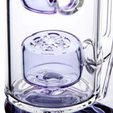 Close-up of Calibear Straight Fab Puffco Attachment in clear glass with purple accents