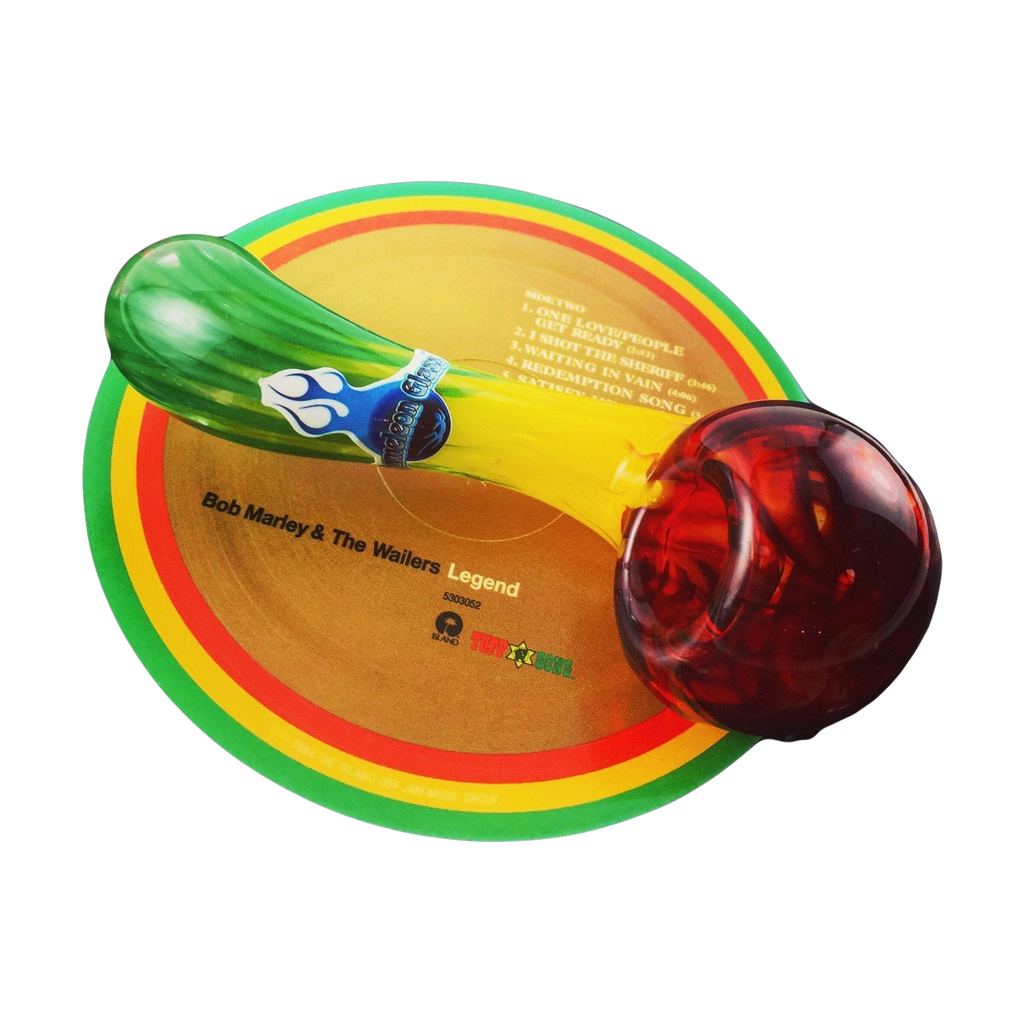 Chameleon Glass Dubdancer Sherlock Pipe with vibrant color design on vinyl record background