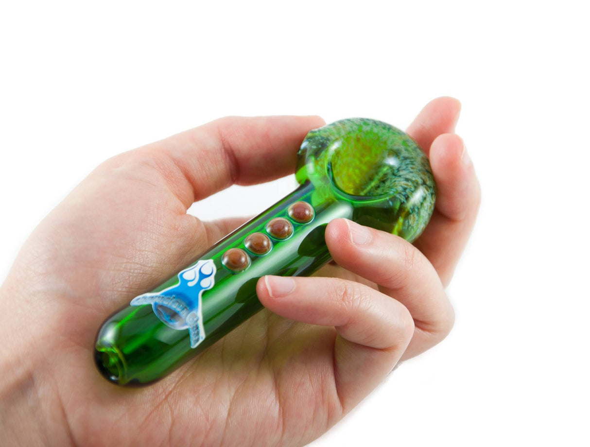 Chameleon Glass Itty Bitty Fritty hand pipe with intricate design, held in hand - DankGeek
