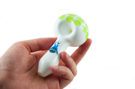 Chameleon Glass Just The Tip hand pipe in hand, green spots on white borosilicate glass