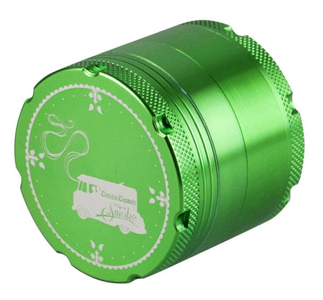 Cheech & Chong's Up In Smoke green metal 4-part grinder, top view showing detailed design