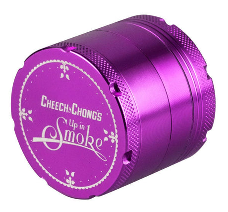 Cheech & Chong's Up In Smoke purple metal 4-part grinder, angled view on white background