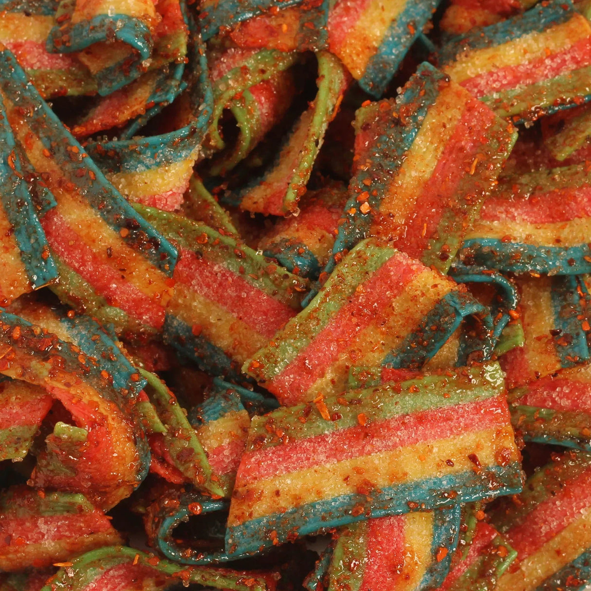 Close-up of Chilli Bomba Rainbow Belts 8oz, colorful sugary candy strips with a tangy coating