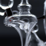 Close-up of Clayball Glass "Crimson Dreams" Heady Recycler Dab-Rig with intricate glasswork