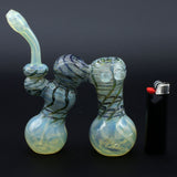 Clayball Glass "Dub-Bubb" Sherlock Double Bubbler with intricate design, side view next to lighter