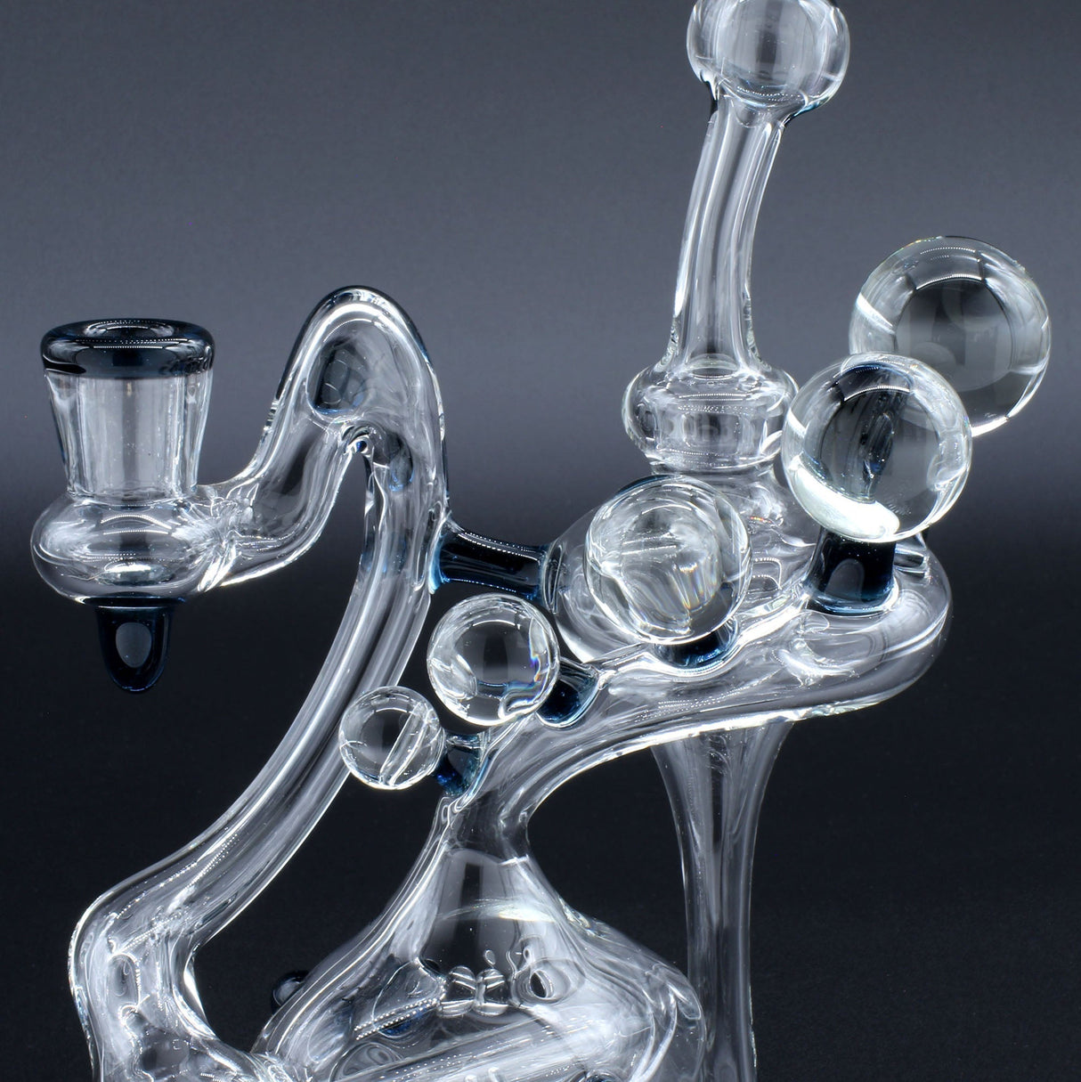 Clayball Glass "Electric Moon" Heady Recycler Dab-Rig with intricate glasswork, front view on a black background