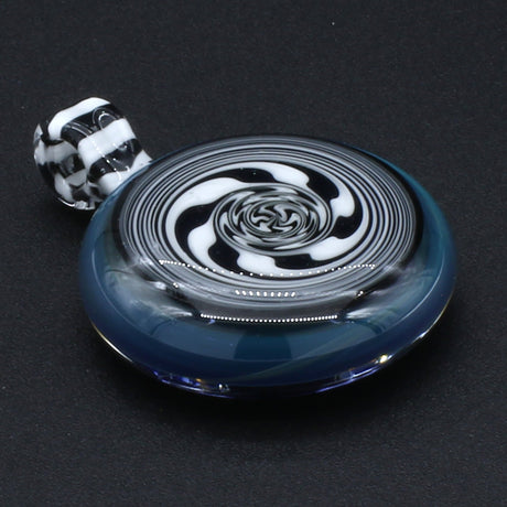 Clayball Glass "Enter the Void" black and white swirl glass pendant on dark background