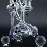 Clayball Glass "Milky Way" Heady Recycler Dab-Rig with intricate glasswork, front view on black background
