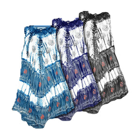 Colorful tie-dye and white die block dresses on display, one-size fits all, crafted in India