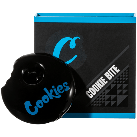 Cookies Bite Pipe, black borosilicate glass spoon pipe with logo, front view on packaging