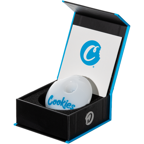 Cookies Bite Pipe made of Borosilicate Glass, displayed in box, angled view with Cookies branding