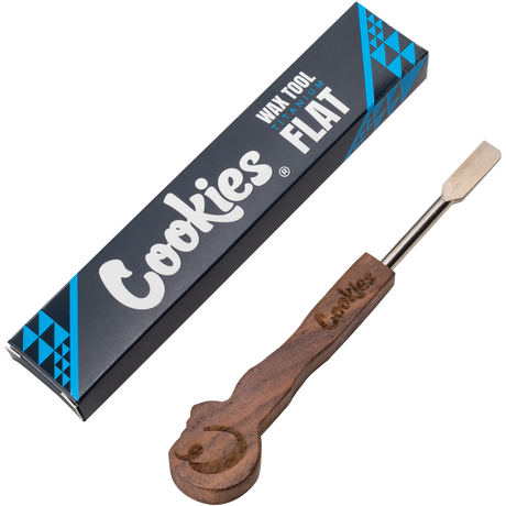 Cookies Titanium Flat Wax Tool with wooden handle beside packaging