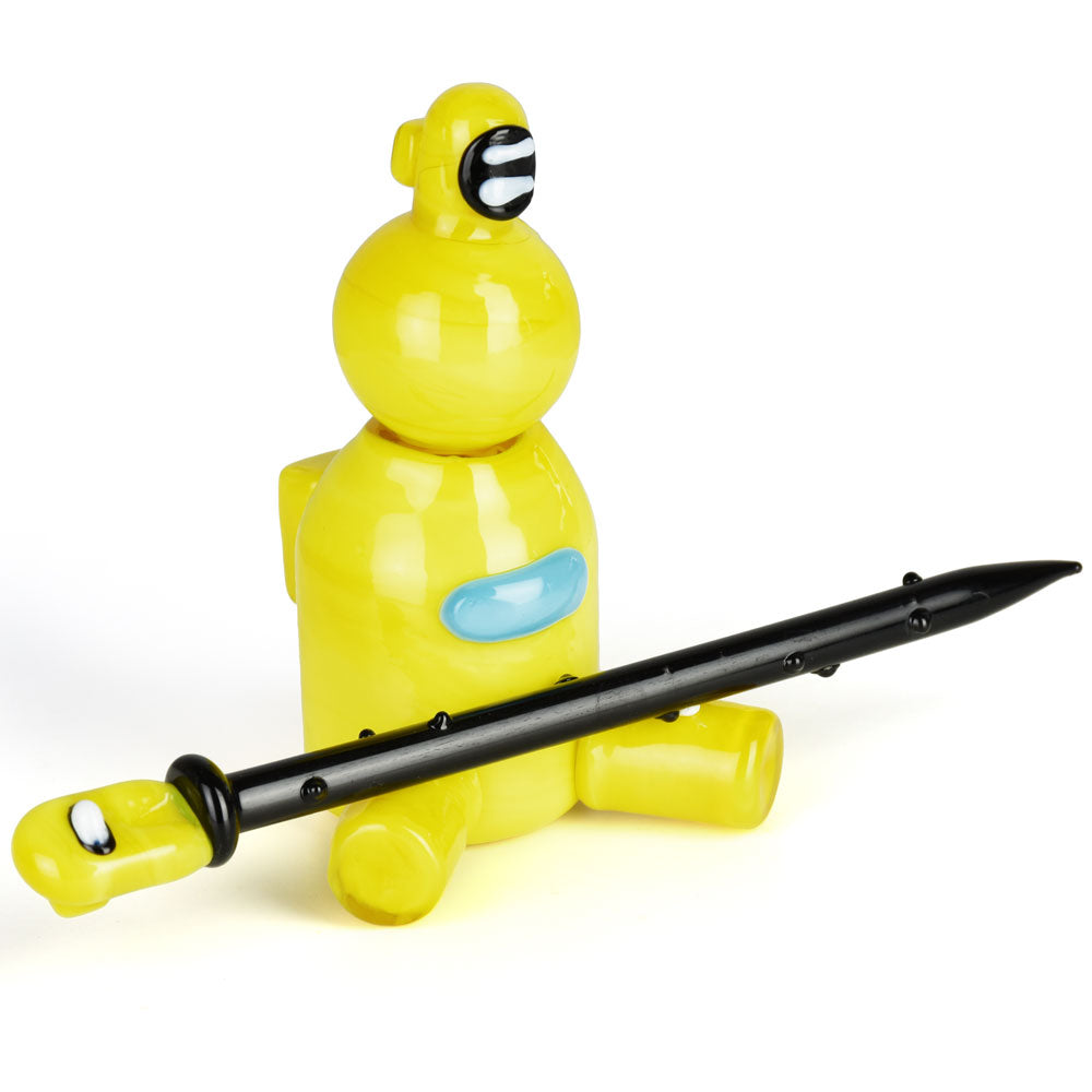 Yellow borosilicate glass dabbing set with black dabber and carb cap on stand, front view