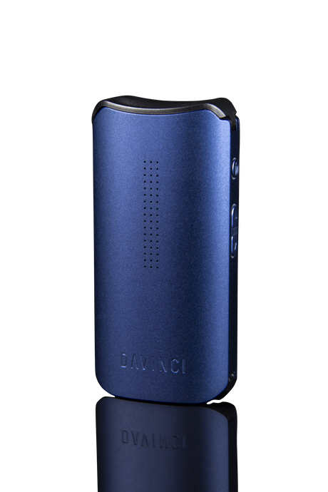 DaVinci IQC Vaporizer in Blue - Front View on Reflective Surface, Portable Design for Dry Herbs and Concentrates