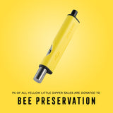 Dip Devices Little Dipper Vaporizer in yellow, angled view with charity message