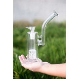 1Stop Glass Upright Bubbler with Perc, clear blue, held in hand, compact design for dry herbs