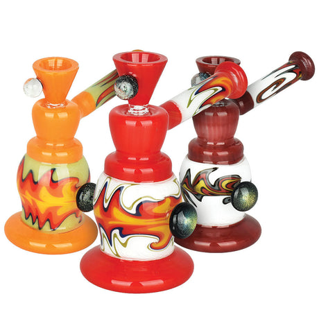 Ego Death Bubbler Pipes in red, orange, and white with flame designs, 5.25" tall, made of borosilicate glass