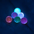 UV reactive terp pearls glowing under blacklight