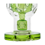 Calibear Exosphere Dab Rig with intricate green accents and beaker design, 14mm joint - front view