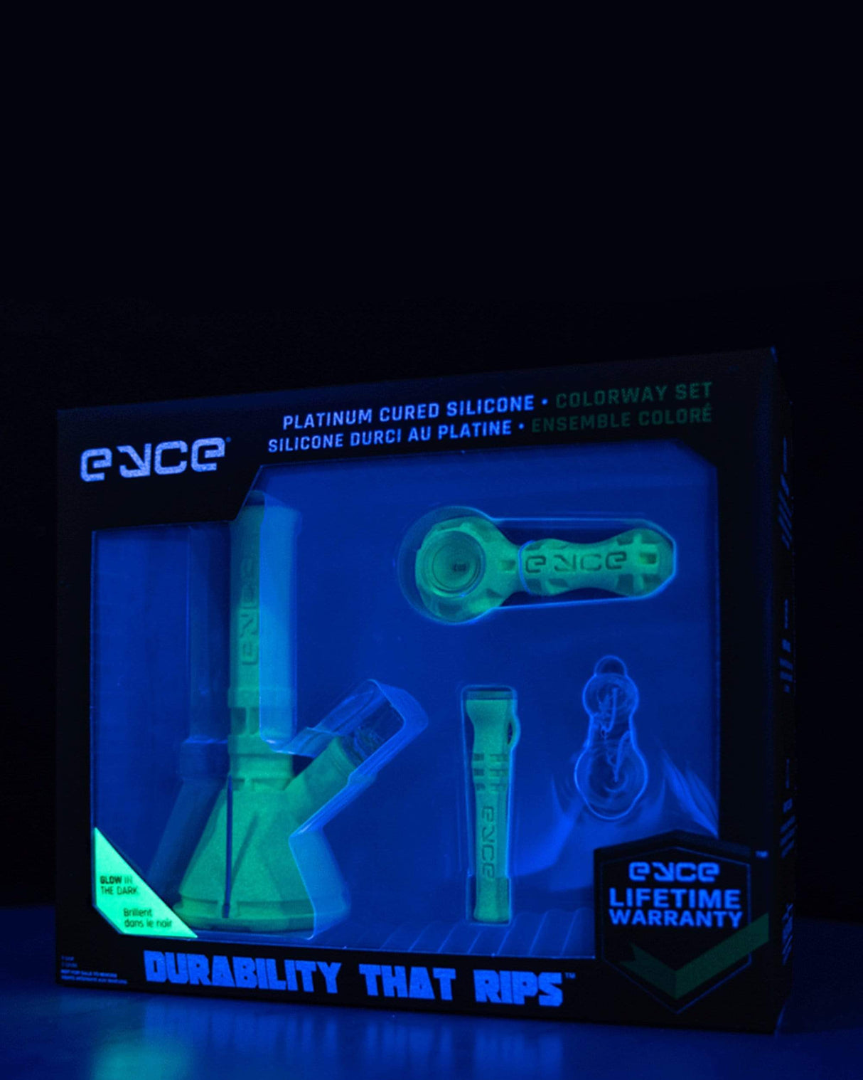 Eyce Colorway Boxed Set glowing in the dark, showcasing durable silicone bong and accessories