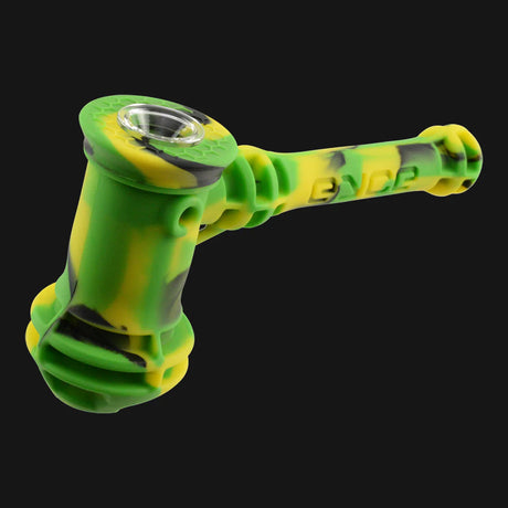Eyce Hammer Bubbler in Jamaica color variant, angled side view on a black background